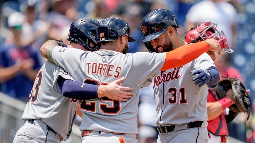 Detroit Tigers teammates celebrate during a game - 2025 MLB Division Winner Odds Tracker
