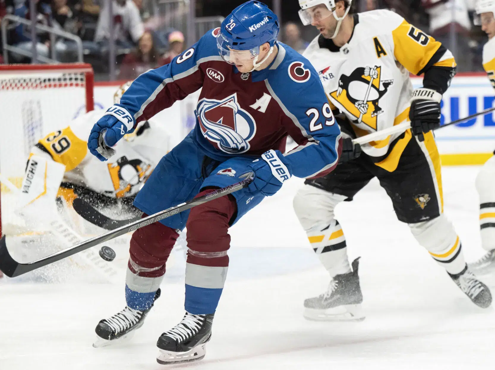 Nathan MacKinnon and Kris Letang