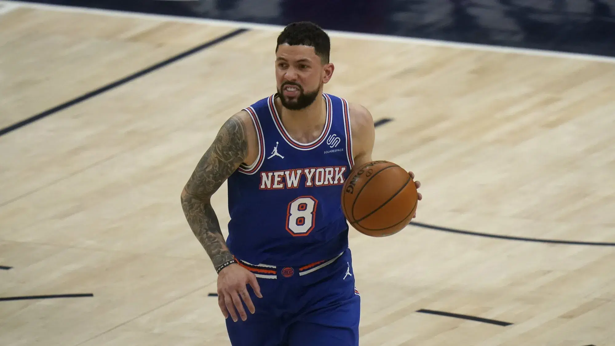 New York Knicks guard Austin Rivers (8) brings the ball up court in the second half during an NBA basketball game against the Utah Jazz Tuesday, Jan. 26, 2021, in Salt Lake City. (AP Photo/Rick Bowmer)
