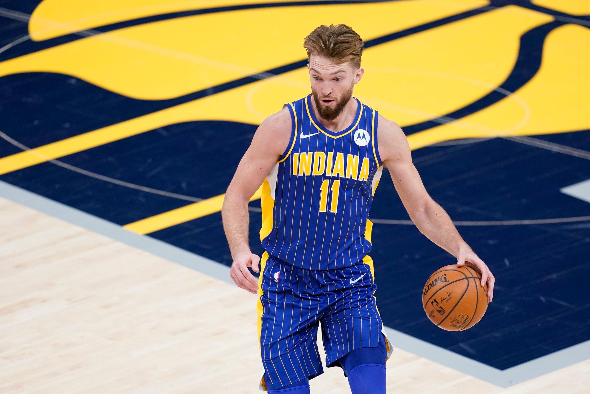Indiana Pacers forward Domantas Sabonis (11) dribbles during the first half of an NBA basketball game against the Denver Nuggets, Thursday, March 4, 2021, in Indianapolis. (AP Photo/Darron Cummings)