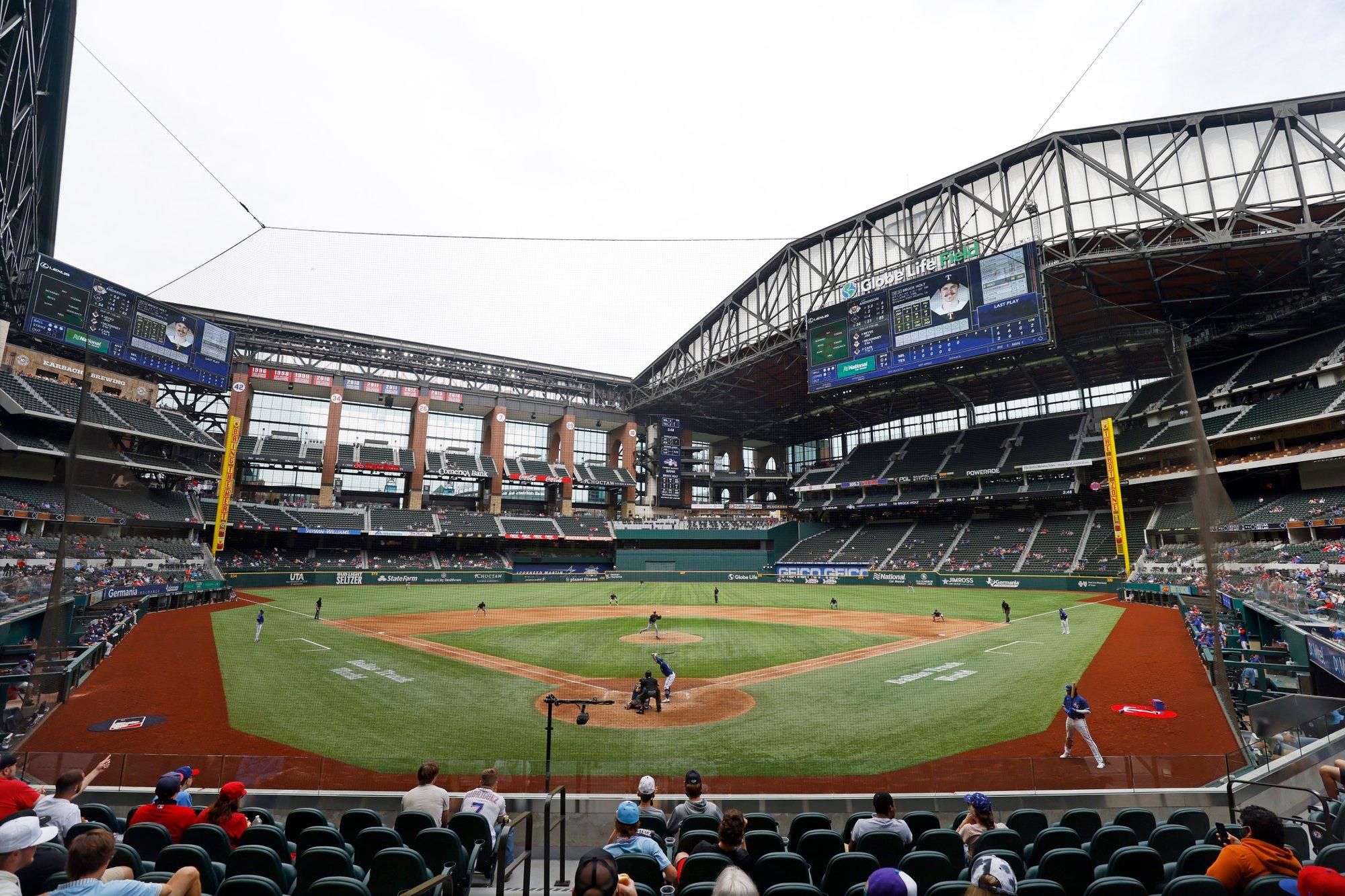 The Texas Rangers and the Milwaukee Brewers play a preseason baseball game at Globe Life Field, Tuesday, March 30, 2021, in Arlington, Texas. (AP Photo/Michael Ainsworth)