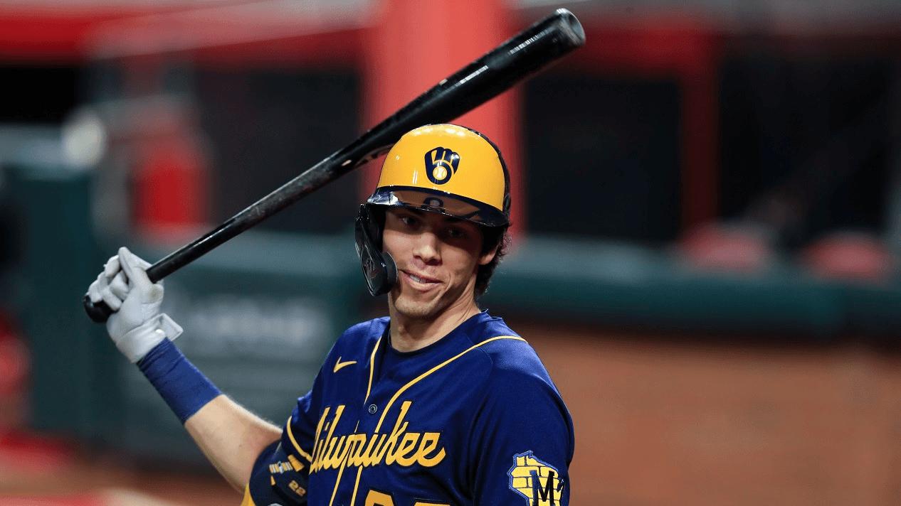 FILE - Milwaukee Brewers' Christian Yelich waits to bat during a baseball game against the Cincinnati Reds in Cincinnati, in this Monday, Sept. 21, 2020, file photo. The average Major League Baseball salary dropped for an unprecedented third straight year, even before the shortened season caused by the novel coronavirus pandemic.  Last year’s drop showed the widening imbalance between top stars and other players. The average fell despite Gerrit Cole, Stephen Strasburg, Anthony Rendon and Christian Yelich all starting long-term contracts guaranteeing $215 million or more. (AP Photo/Aaron Doster, File)