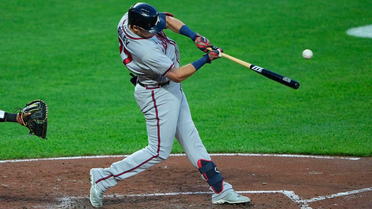 Austin Riley batting against the Rockies