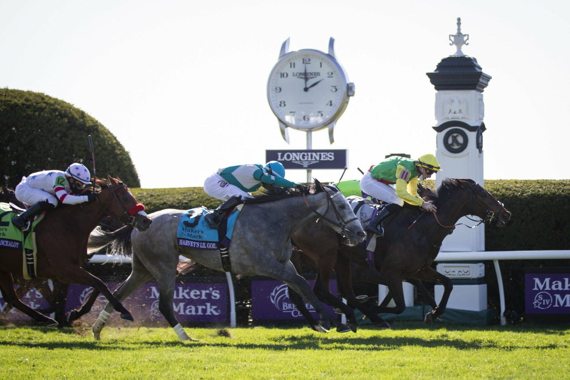 Horses at the wire on Keeneland turf