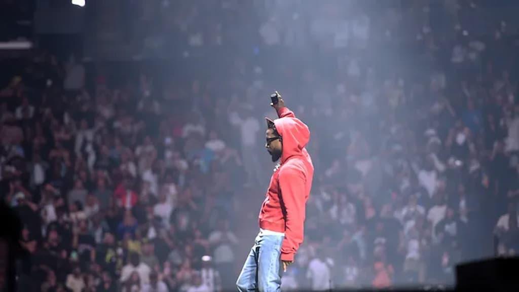 Award-winning rapper Kendrick Lamar performs in front of a crowd