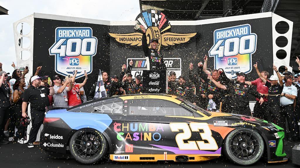 2026 NASCAR Cup Series Brickyard 400 Predictions & Picks cover (Bubba Wallace celebrating his 2025 Brickyard 400 win)