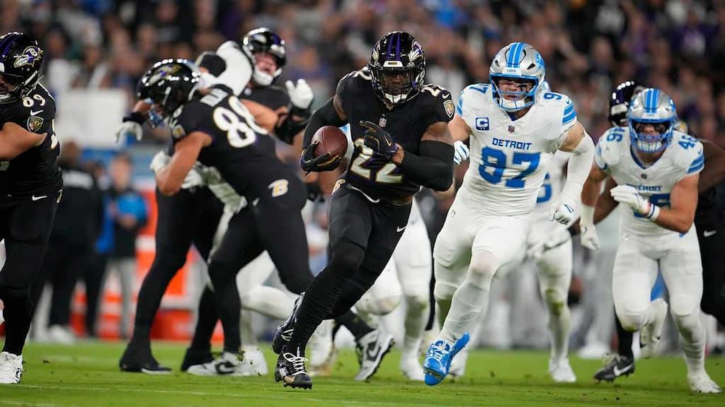 NFL Over/Under Betting Guide cover (Baltimore Ravens running back Derrick Henry against the Detroit Lions)