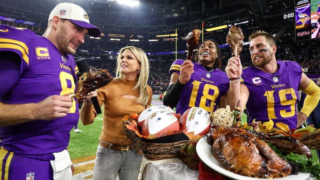NFL Holiday Games Betting Guide cover (Minnesota Vikings players celebrate with turkey on Thanksgiving)