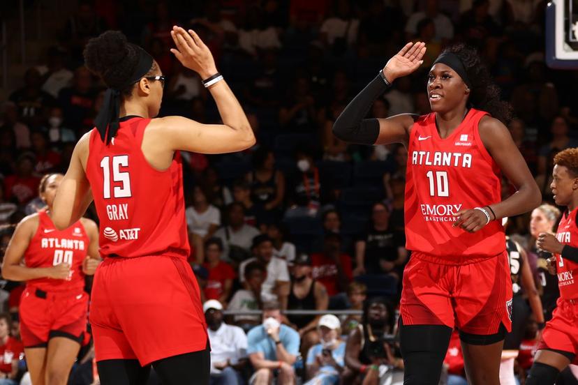 Dream teammates high fiving