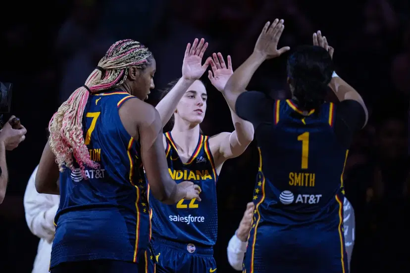 Fever players high five