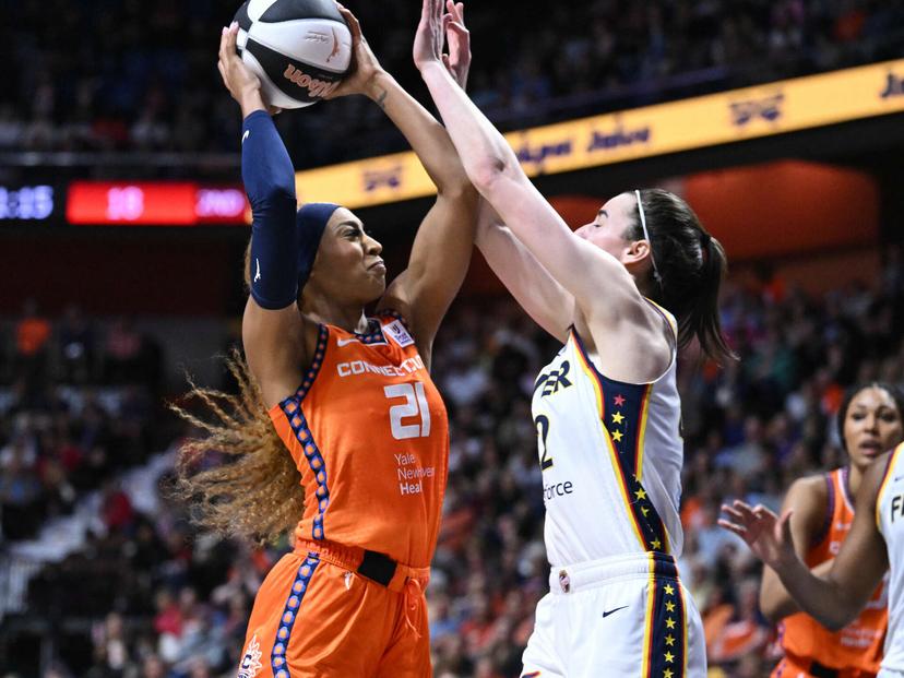 DiJonai Carrington and Caitlin Clark