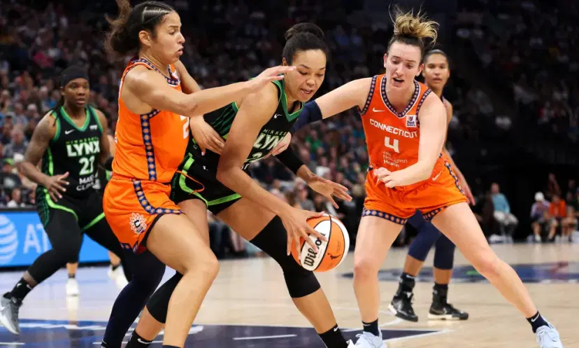 Napheesa Collier and Sun defenders