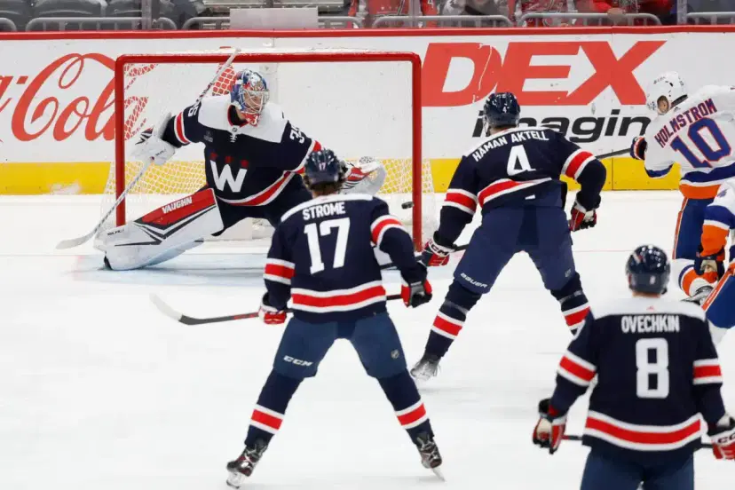 Simon Holmstrom and Capitals defenders