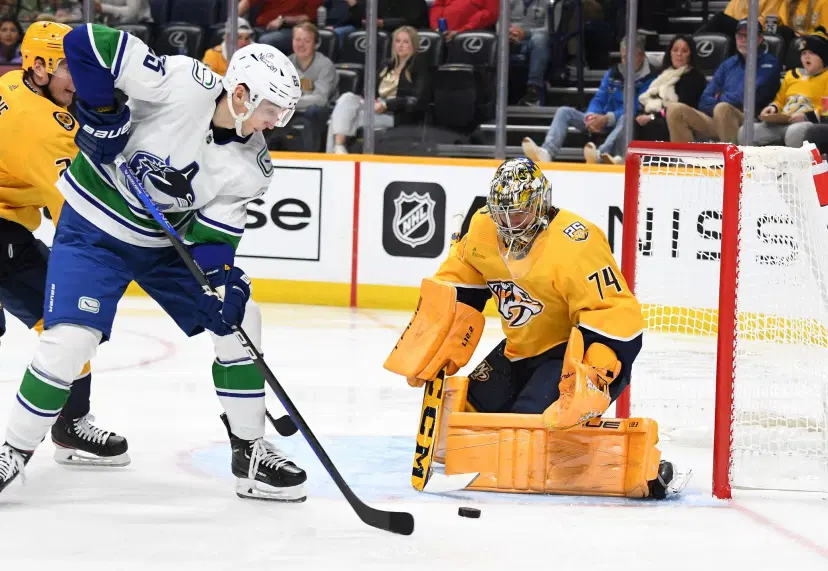 Juuse Saros and Canucks player