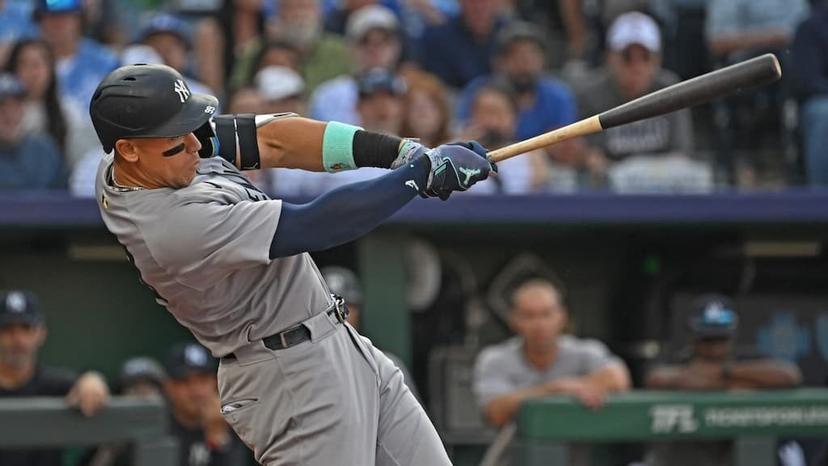 New York Yankees slugger and AL MVP favorite Aaron Judge swings the bat - 2025 MLB MVP Odds & Favorites cover