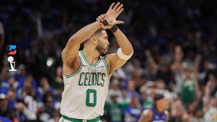 Jayson Tatum grabs his wrist