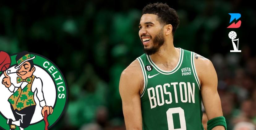 Jayson Tatum smiling in Boston Garden with Celtics logo.