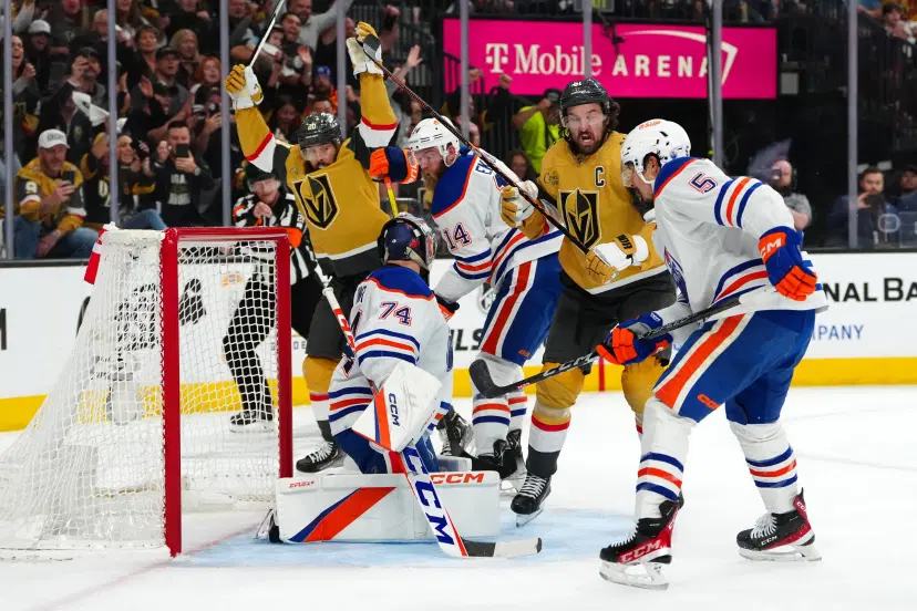 Knights players in front of Oilers goal