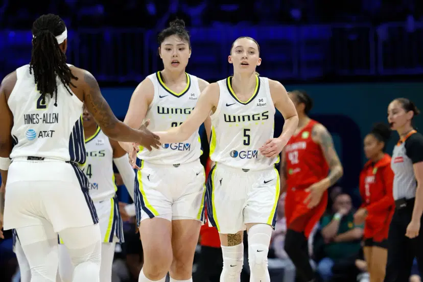 Paige Bueckers and Arike Ogunbowale