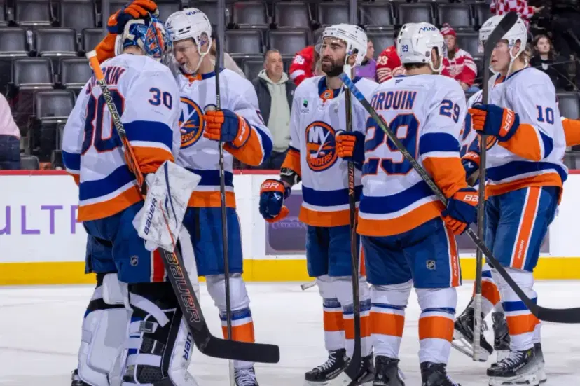Ilya Sorokin and teammates
