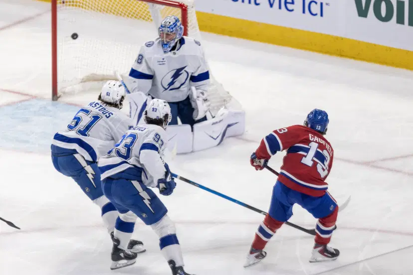 Cole Caufield and Andrei Vasilevskiy