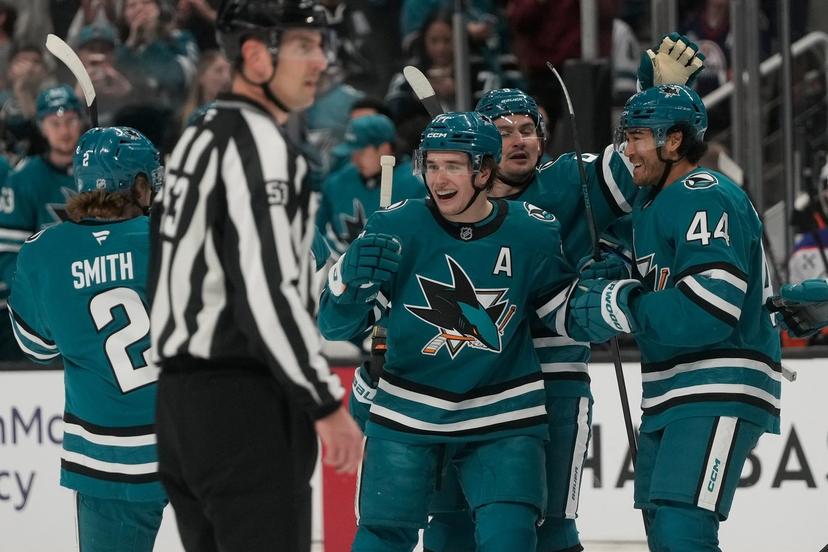 Macklin Celebrini and teammates
